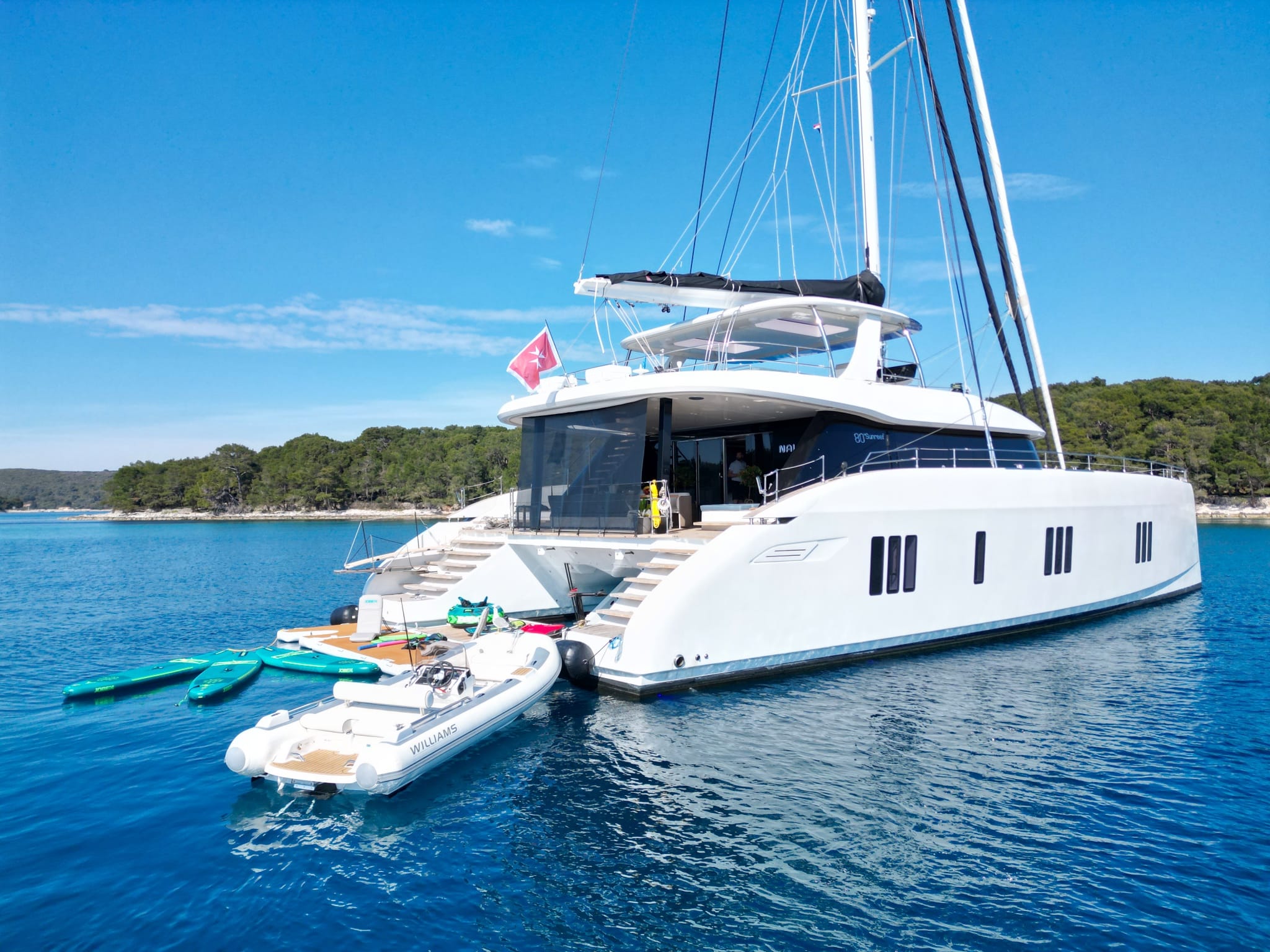 Sunreef 80 for charter in croatia with floating beach and water toys